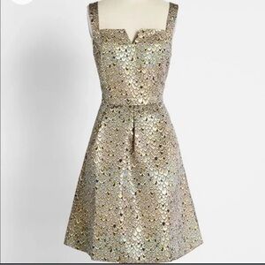 Mermaid or dragon scales? You decide! This dress is enchanting and whimsical.